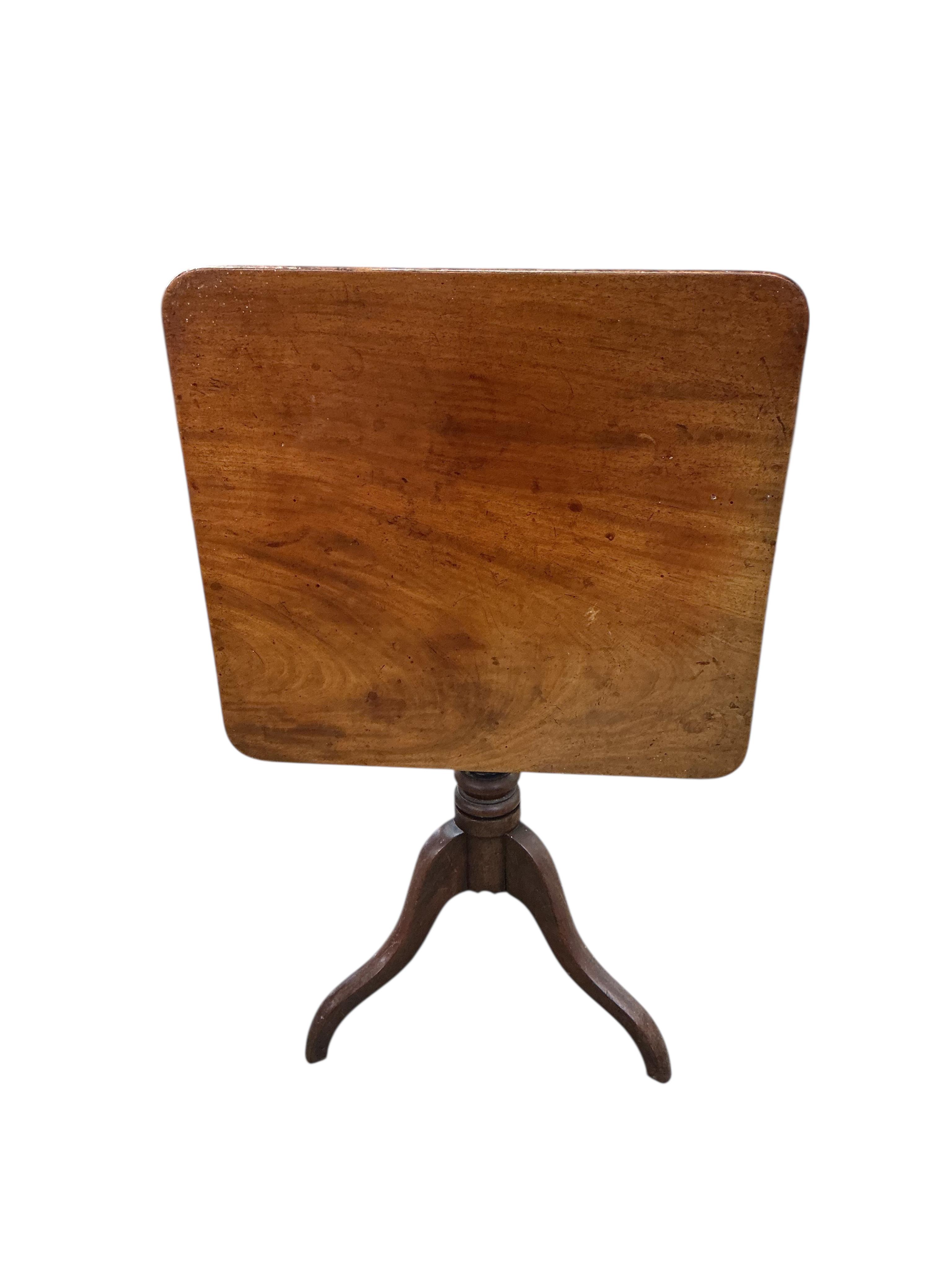 A Regency rectangular mahogany tilt top tripod tea table, width 65cm, depth 60cm, height 74cm